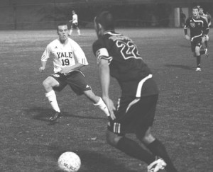Rookie Andy Shorten ‘11 tries to get the ball past a Brown defender on Nov. 3. The Elis beat Princeton 2-0 at Princeton Stadium this weekend.