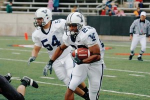 Mike McLeod ’09 carries the ball during Yale’s victory over Princeton on Saturday. His numbers were below his season average, but still more than enough for the Elis.