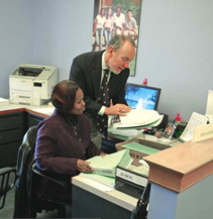 Dean of Undergraduate Admissions Jeff Brenzel and Djuna Outlaw read an early application. Harvard and Princeton universities did not offer any early admissions programs this year.