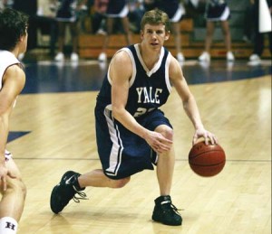 Eric Flato ’08 moves the ball up the court against Harvard last season. Flato scored 10 points in the Bulldogs’ 89-80 loss to UMass-Amherst last night.