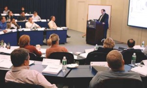 Senior associate dean of executive programs and management professor Jeffrey Sonnenfeld gives a lecture to Bearing Point consulting executives at the Omni Hotel.