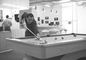 A Google employee lines up his corner shot in the company’s “very casual” and “relaxed” office space.