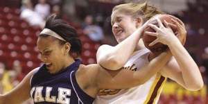 Arizona State center Kirsten Thompson maintains control of the ball as Yale guard Ashley Easley ’09 attempts a steal in the 84-38 Eli loss.