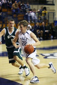 Guard Eric Flato ’08, who scored five points Saturday, drives during the first half of the team’s loss to Wagner.