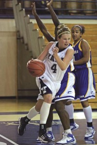 Melissa Colborne ’10 moves past the Hofstra defence last night at home. Colborne’s 12 for 12 in free throws helped the Elis beat the Pride, 73-67.