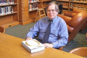 Law School librarian Fred Shapiro shows off a copy of his book, “The Yale Book of Quotations.” His book aims to challenge the traditional collection of quotations, “Bartlett’s Book of Quotations,” by emphasizing contemporary American quotations as opposed to British quotations.