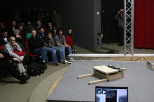 Students watch a demonstration of The Robotic Chair at the Yale Art Gallery. The “smart chair” can collapse and recover almost 100 percent of the time.