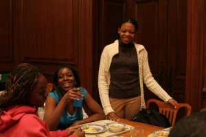Silliman ethnic counselor Funmi Showole ’08, standing, shares a laugh with freshmen Arziki Adamu and Constance Collins.