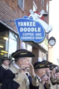 The Lancraft Fife and Drum Corps shows its support on Sunday for the Yankee Doodle, which closed Jan. 28, citing economic difficulties.
