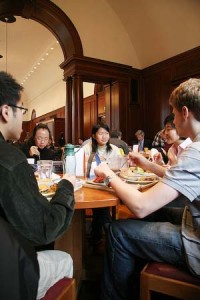 Exchange students from New Asia College in Hong Kong eat in Silliman College during a trip to Yale.