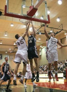 Matt Kyle ’08 slams the ball against Brown on Jan. 19, in a game Yale won 66-63. The Elis will take on Harvard and Dartmouth this weekend at home.