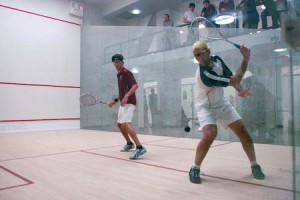 Moshe Sarfaty ’08 plays a shot against Harvard’s J. Reed Endresen. Sarfaty won the match, 3-0, contributing to the Bulldogs’ 7-2 victory over the Crimson.