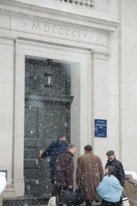 Members of the Yale Corporation, accompanied by Yale College Dean Peter Salovey, arrive at Woodbridge Hall for their meeting Friday.