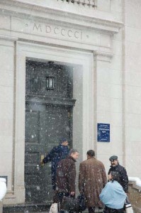 Members of the Yale Corporation arrive Friday at Woodbridge Hall with Yale College Dean Peter Salovey. The Corporation is known for operating in secrecy.