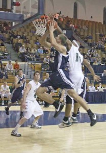 Garrett Fiddler ’11 drives against Dartmouth on Feb. 9 at home. Fiddler and the Elis struggled to create enough offense this weekend to make up for their defensive struggles.