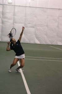 Jessica Rhee ’10 serves during her 7-6, 6-0 win at the No. 2 singles position over Sara Mansur of Brown. Despite losing the doubles point, Yale rallied to win four of the six singles matches to defeat Brown, 4-3.
