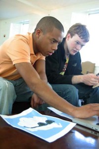 Vincent McPhillip ’10 and Robert Henehan ’10 discuss production of T-shirts at a meeting of the newly formed Catalyst Company. The pair will remain in New Haven on a YEI fellowship this summer to develop their budding business plans.