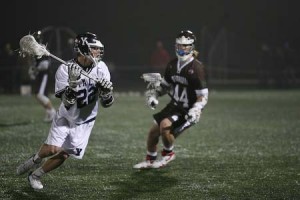 Middie Davis Lindsey carries the ball upfield during a 9-8 last-second loss to Brown at home on April 4.