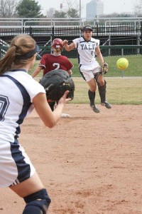 Captain Aracelis Torres ’08 throws to first in a game against Harvard last Sunday. The Elis will need to play strong defense this weekend.