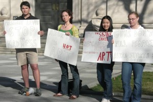 Students gather on Beinecke Plaza on Thursday to protest a senior art project that purpoted to display the menstrual blood from self-induced miscarriages.