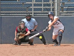 Megan Enyeart ’09 swings at a low pitch last weekend in a loss against Harvard. Eli bats were stronger against Dartmouth this weekend, especially Saturday.