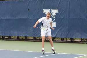 Calvin Bennett ’11 returns a shot during a home match earlier this season. The rookie won in straight sets against Dartmouth on Sunday.