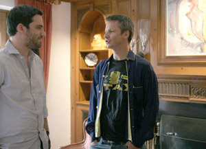 John Cameron Mitchell, right, speaks with a guest following a Branford College Master’s Tea on Friday. Mitchell, best known as the director of “Shortbus,” discussed topics ranging from masturbation to pornography during his visit to campus.