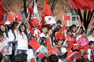 Protesters supporting the Chinese government in advance of the 2008 Olympic games convene on the Green on Saturday.