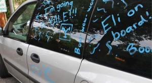 Stephanie Weinraub ’12 shows off her Eli pride from the start. Her spirited minivan has been parked outside the Courtyard Marriott this week.