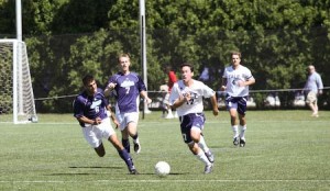 Midfielder Eric Meyer ’11 dribbles upfield. In the 62nd minute, Meyer headed a cross from Charlie Neil ’12 into the right corner, giving Yale a two-goal cushion into which Maine was unable to put a dent.