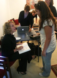 Author Philippa Gregory signs books at a Morse College Master’s Tea on Wednesday, where she explained “female badness.”