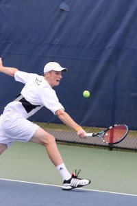 Michael Caldwell ’09 hits a backhand against Columbia on April 11. Caldwell won the doubles “B” flight with Joel Samaha ’12 this weekend.