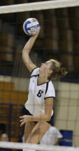 Cat Dailey ’10 spikes the ball during a win against Colgate on Sept. 13. She had a game-high 15 kills.