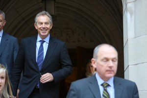 Professor Tony Blair strides down the Law School steps with a smile, evidently pleased to be back at Yale.