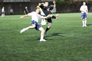 Midfielder Jordan Raybould ’10 steals the ball away during Nov. 15’s game against Princeton, which ended in a tie.