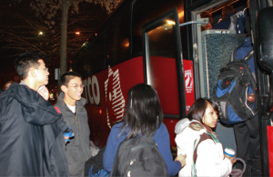 Students wait in 29-degree weather to board the Asian-American Cultural Center bus to the inauguration of President-elect Barack Obama.