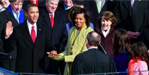 Barack H. Obama is sworn in by Chief Justice John Roberts as the 44th president of the United Statesas on the West Front of the Capitol as his wife Michelle looks on January 20, 2009 in Washington, DC. Obama becomes the first African-American to be elected to the office of President in the history of the United States.