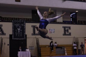 Brigitte Kivisto ’10 performs her floor routine against Bridgeport in the Elis’ home opener last Saturday, taking third overall with a 9.775 score.