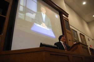 Due to a time conflict, Sen. Feingold speaks to an audience at the Law School via a video feed. He discussed Obama’s and Bush’s administrations, and took questions by videoconference.