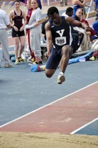 Bashir Adeniyi ’10 competes in the triple jump on Feb. 6. The men’s team finished second at H-Y-P this weekend.