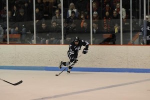 Center Brian O’Neill ’12 plays against Princeton on Saturday. The freshman had two shots against the Tigers and has nine goals on the season.