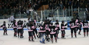 In front of a capacity crowd at Ingalls Rink, the men’s hockey team celebrates on Friday after defeating Cornell, 4-2, to clinch the ECAC regular season championship. It was the Elis’ first conference title since the 1997-’98 season.