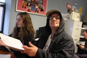 Heather Soleau ’11 helps Anthony Santangelo explore employment opportunities at the local National Student Partnership office.