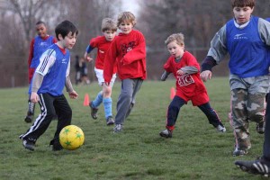 Participants in New Haven Youth Soccer’s Under 10 group enjoy an energetic soccer game in Edgewood Park.