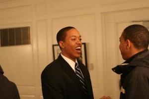 Mike Jones ’11 speaks with a supporter during his campaign for the position of Ward 1 alderman.