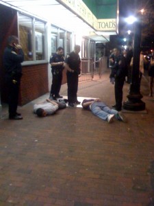 Police detain several men after a fight broke out early Sunday morning outside Toad’s Place on York Street.