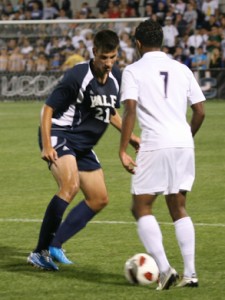 Defender Milan Tica ’13 shuts down a UConn forward on Sept. 4. The Elis lost to South Carolina 2–1 on Sunday.