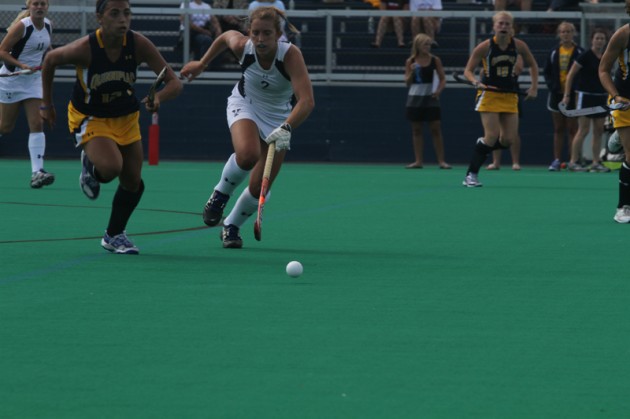 Forward Mary Beth Barham ’13 fights for a ground ball on Sept. 5. The Elis lost in overtime to UMass on Sunday.