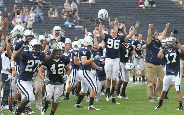 Bulldog players and fans rush the field after Patrick Witt's '12 game-winning touchdown as time expired.
