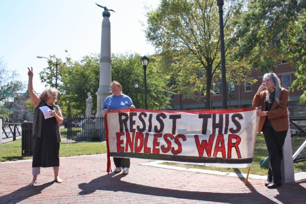 Every Sunday for the past 11 years, Joan Cavanagh GRD ’96 has taken her post on the median between Elm, Park and Broadway to make her anti-war views known.